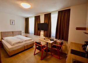 Ένα ή περισσότερα κρεβάτια σε δωμάτιο στο Haus Kanzel