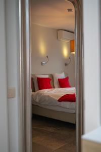 Ένα ή περισσότερα κρεβάτια σε δωμάτιο στο Guesthouse Amfora