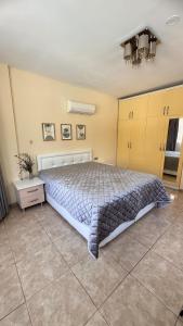 a bedroom with a large bed in a room at Dalyan Turaman private pool sleeps 10 in Ortaca +65 photos