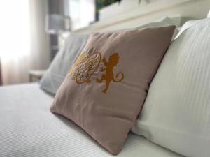 Postel nebo postele na pokoji v ubytování Hotel Max