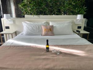 Postel nebo postele na pokoji v ubytování Hotel Max