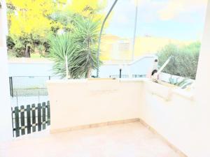 a view from the balcony of a building with palm trees at SalMar Campomarino in Campomarino