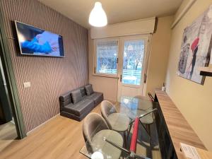 Et tv og/eller underholdning på Egles Apartments Lignano Sabbiadoro Arena Beach