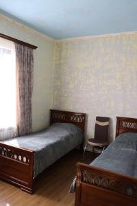 Postel nebo postele na pokoji v ubytování New Garni 2