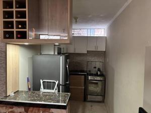 Køkken eller tekøkken på Chiclayo Living Tu Apartamento Ideal en el Centro