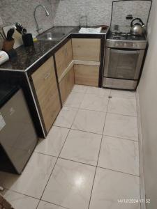 Køkken eller tekøkken på Chiclayo Living Tu Apartamento Ideal en el Centro