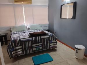 En eller flere senge i et værelse på Aguamarina Suites + 17 billeder