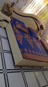 En eller flere senge i et værelse på Appartement Arconville