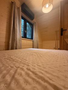 Postel nebo postele na pokoji v ubytování W Sam Las