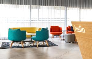 Posezení v ubytování Prima City Hotel