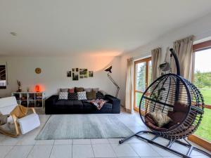 Et opholdsområde på Eulennest im Ferienhaus an der Holzecke + 24 billeder