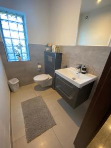 Koupelna v ubytování Victoria Domek do wynajecia + 14 fotografií