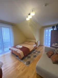 Postel nebo postele na pokoji v ubytování Victoria Domek do wynajecia