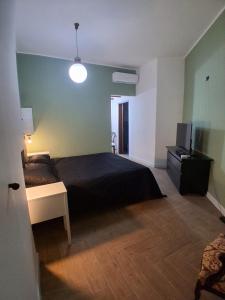 Postel nebo postele na pokoji v ubytování B&B - Holiday Tennis House