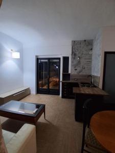 Posezení v ubytování B&B - Holiday Tennis House