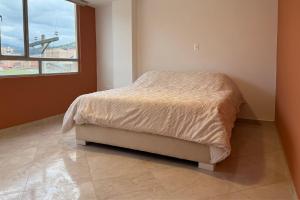 Postel nebo postele na pokoji v ubytování Exclusivo Apartamento en Sogamoso + 5 fotografií