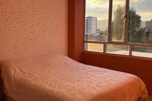 Postel nebo postele na pokoji v ubytování Exclusivo Apartamento en Sogamoso