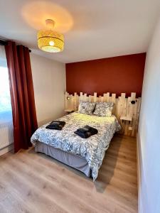 Postel nebo postele na pokoji v ubytování Maison avec Jardin 6 Couchages & Parking gratuit à proximité du Futuroscope