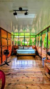 En eller flere senge i et værelse på Arbura