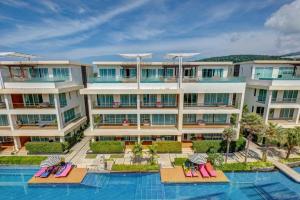 Bazén v ubytování Luxury 112 m 2BR, Direct Pool Access, 1st Line, Klong Muang Beach nebo v jeho okolí