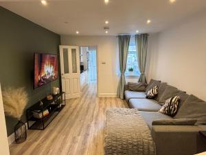 Et opholdsområde på Adrian Cottage