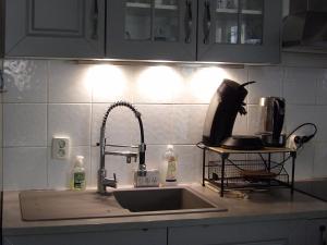 Køkken eller tekøkken på Appartement tout confort Piscine Parking + 8 billeder