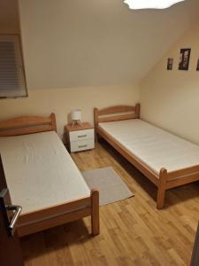 En eller flere senge i et værelse på Vikendica Maksimović - Tara - Primamo vaučere