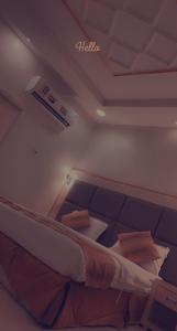 Ένα ή περισσότερα κρεβάτια σε δωμάτιο στο التميز الشرقي