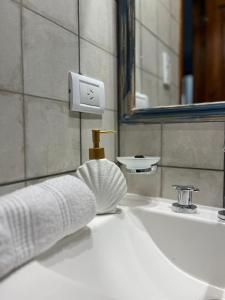 Koupelna v ubytování Cerquita del Mar II + 10 fotografií