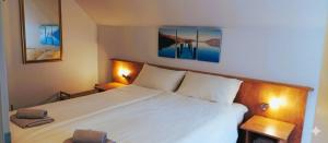 Giường trong phòng chung tại Wald Villa Üssbach