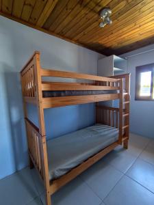 Postel nebo postele na pokoji v ubytování SOBRADO COM PISCINA