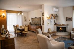 Et opholdsområde på Casa Mia -Per Sentirti a Casa Tua - Giardino, Parcheggio e Jacuzzi