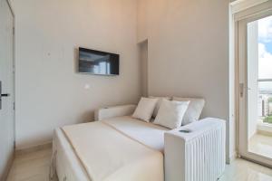 En eller flere senge i et værelse på Encantador Duplex en BOCAGRANDE confort y descanso frente al MAR