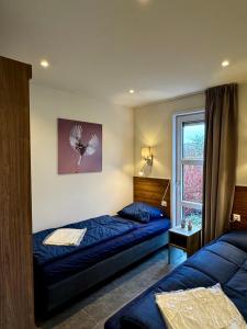 Postel nebo postele na pokoji v ubytování Marina Strandbad Chalet Waterlijn Haus Nr 91