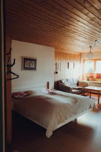 Postel nebo postele na pokoji v ubytování Haus am Weiher + 29 fotografií