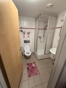 Phòng tắm tại Restaurant & Pension Yammas