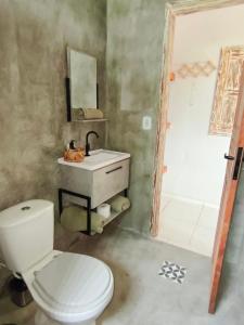 Et badeværelse på Suite privativa em Casa em Corumbau