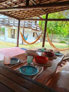 En terrasse eller udendørsområde på Suite privativa em Casa em Corumbau + 23 billeder