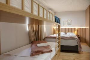 En eller flere senge i et værelse på Casa Sunset