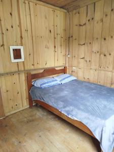 En eller flere senge i et værelse på Chácara Betel + 18 billeder