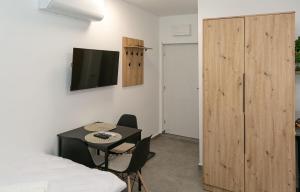 Μια τηλεόραση ή/και κέντρο ψυχαγωγίας στο Apartmani SM Zrenjanin