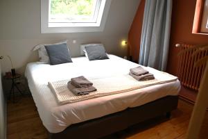 Ένα ή περισσότερα κρεβάτια σε δωμάτιο στο Ryckevelde