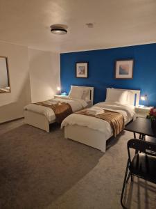 Giường trong phòng chung tại Famenne Escape