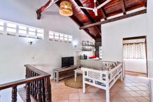 Et tv og/eller underholdning på Villagio Coconut Beachstays