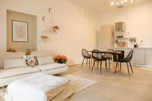 a living room with a couch and a table at Casa Dante in Putignano