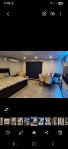 a room with a bed and a dining room with a table at LvL 50 in Murree