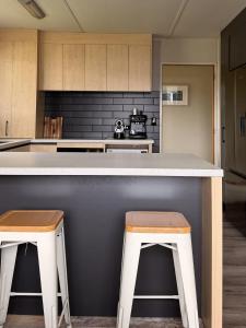 Η κουζίνα ή μικρή κουζίνα στο Kiwi Holidays in Cromwell