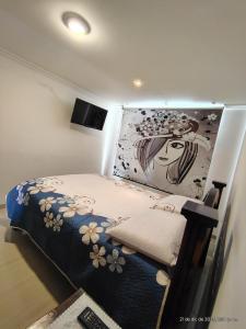 Ένα ή περισσότερα κρεβάτια σε δωμάτιο στο Hospedaje en casa familia