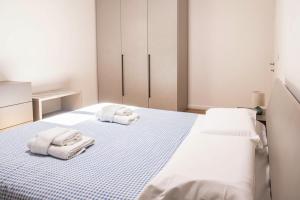 En eller flere senge i et værelse på Ca' Martha - A due passi dal centro con parcheggio privato + 10 billeder