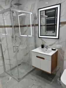 Koupelna v ubytování Apartament Ostrowiec Świętokrzyski